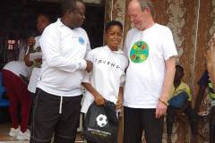 handing-over-soccer-shoes